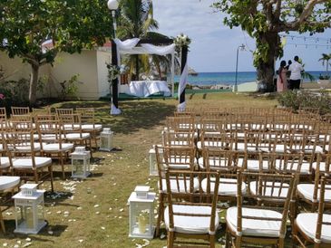 marriage, wedding ceremony on lawn beachfront area.