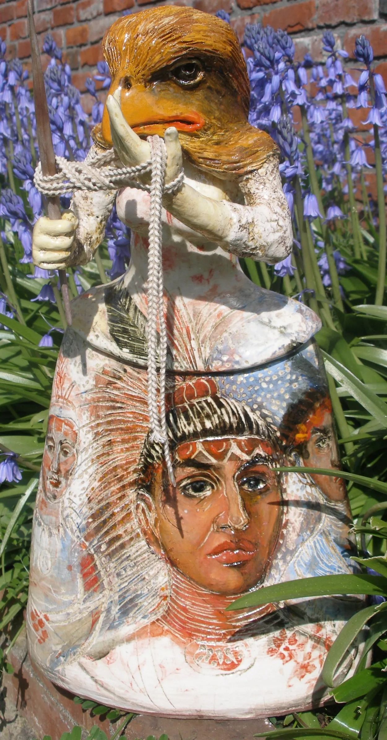 Hawk Lady. 
Hand painted with mason stains and porcelain wash. Mixed media rope.