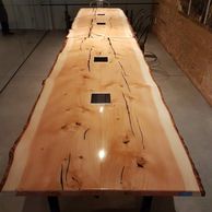 Twin Douglas fir confrence room tables with with ectrical and usb ports. Finished with epoxy.