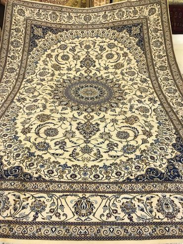 Nain cream and blue wool and silk Persian Carpet size 200 x 300 cms