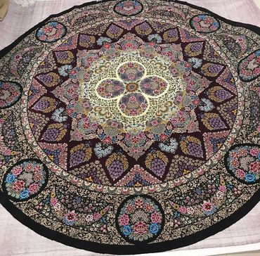 Qom silk round Persian carpet