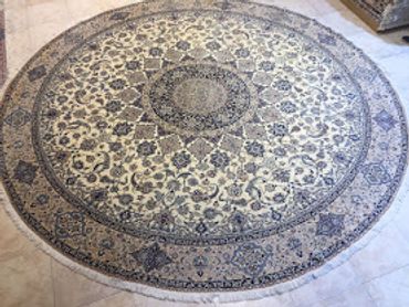 Round handmade Persian carpet Blue and Cream.