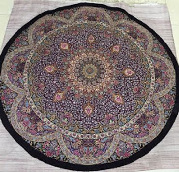 Round handmade Qom silk Persian carpet