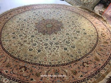 Round luxury floral Tabriz handmade Persian Iranian carpet. Wool and silk. Colors cream and pink