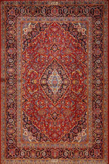 Kashan Red wool rug with Signature of Weaver.