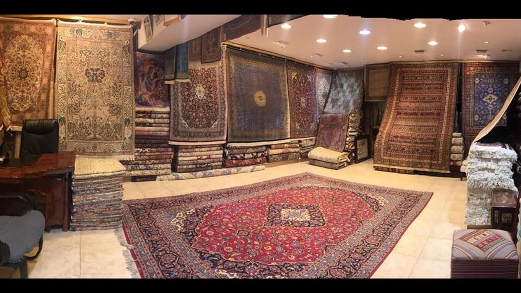 Sheba Iranian Carpets Stores main Showroom with Persian carpets on display. 