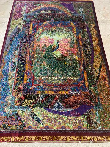 Persian carpet. Peacock in a floral garden.
Silk. Art or tapestry piece size 100 x 150 cms.