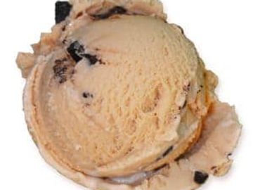 A scoop of coffee-flavored ice cream with chocolate chunks.