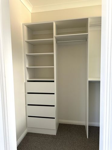 Custom built wardrobe supplied and installed by Peak Cabinetry