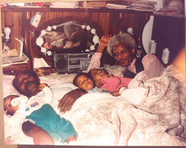 Mommie captured Daddy, his brother Uncle Jerry, and three grandchildren enjoying a family moment.