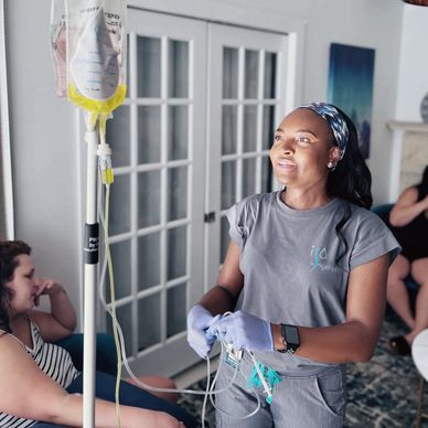Mobile IV hydration nurse administering group IV therapy in South Florida