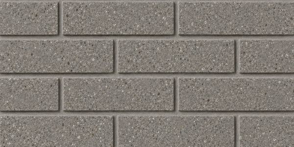 A section of a wall covered with low carbon brick slips