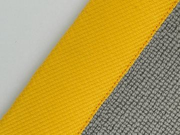 Close-up of yellow and gray textured fabrics.