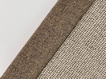 Close-up of fabric textures labeled 'Grizzle' with brown and beige tones.