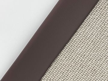 Close-up of a fabric and leather combination labeled 'Brunette'.