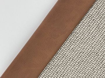 Close-up of three fabric textures: white smooth, brown leather, and gray woven.