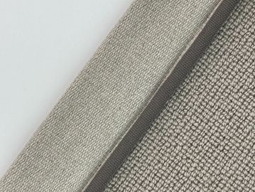 Close-up of textured fabrics in soft beige tones labeled 'Cedar'.