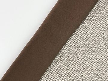 Close-up of fabric with a brown edge labeled 'Forest'.