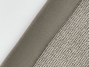 Close-up of textured fabric labeled 'Koala' with smooth and woven sections.