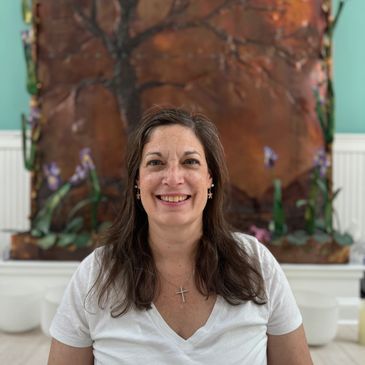 Mary Beth Ronzitti, LMT at Unplug Yoga.