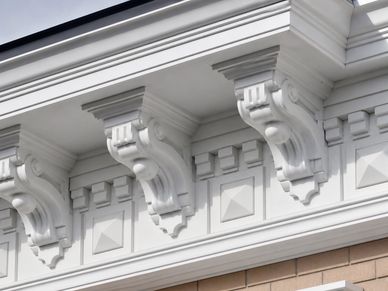 Decorative trim and crown molding inspired by the style of the early 20th century.
