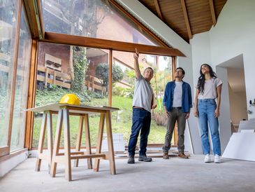 A blueprint of a house with a transparent overlay of a key graphic.