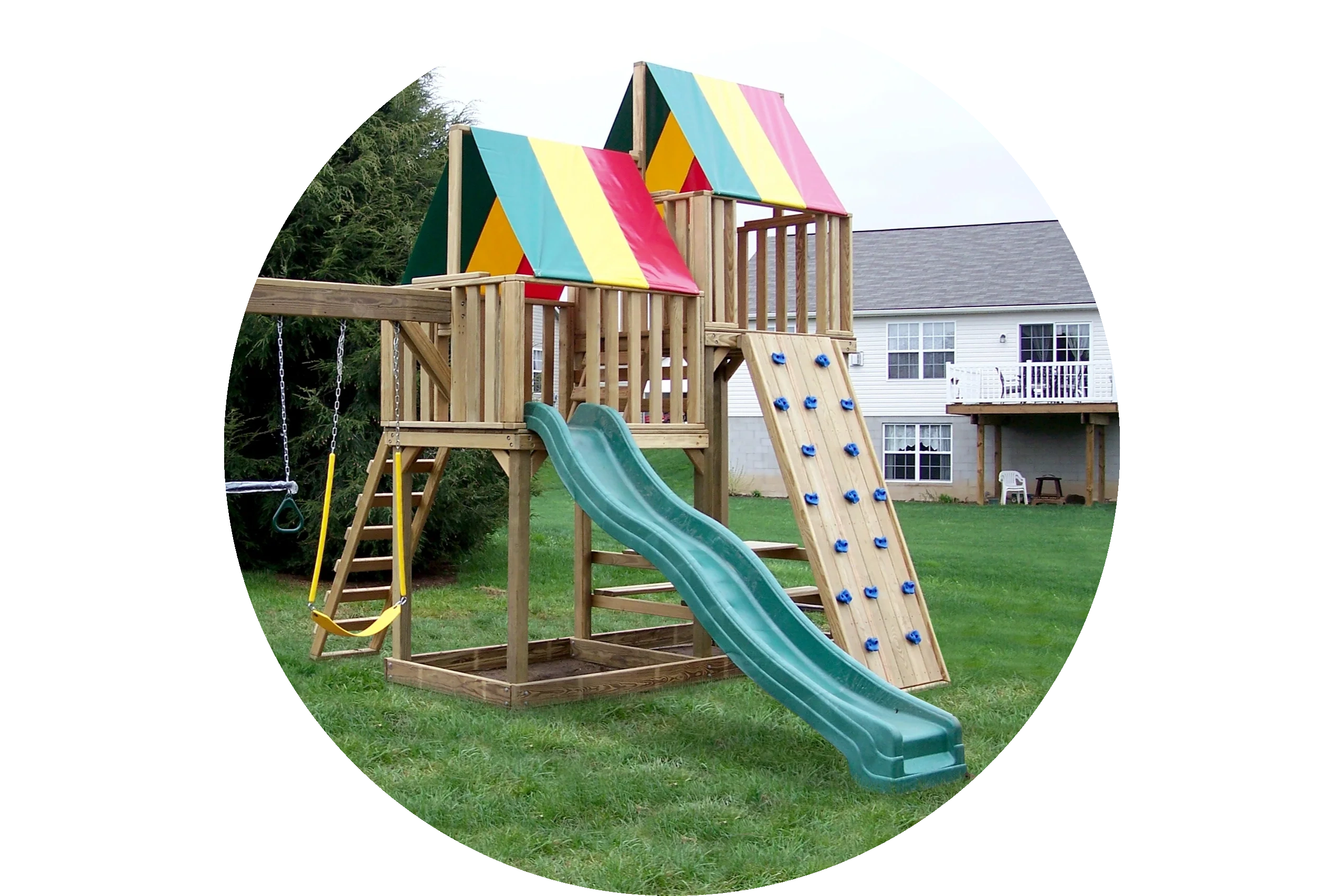A custom built, large wooden outdoor playset