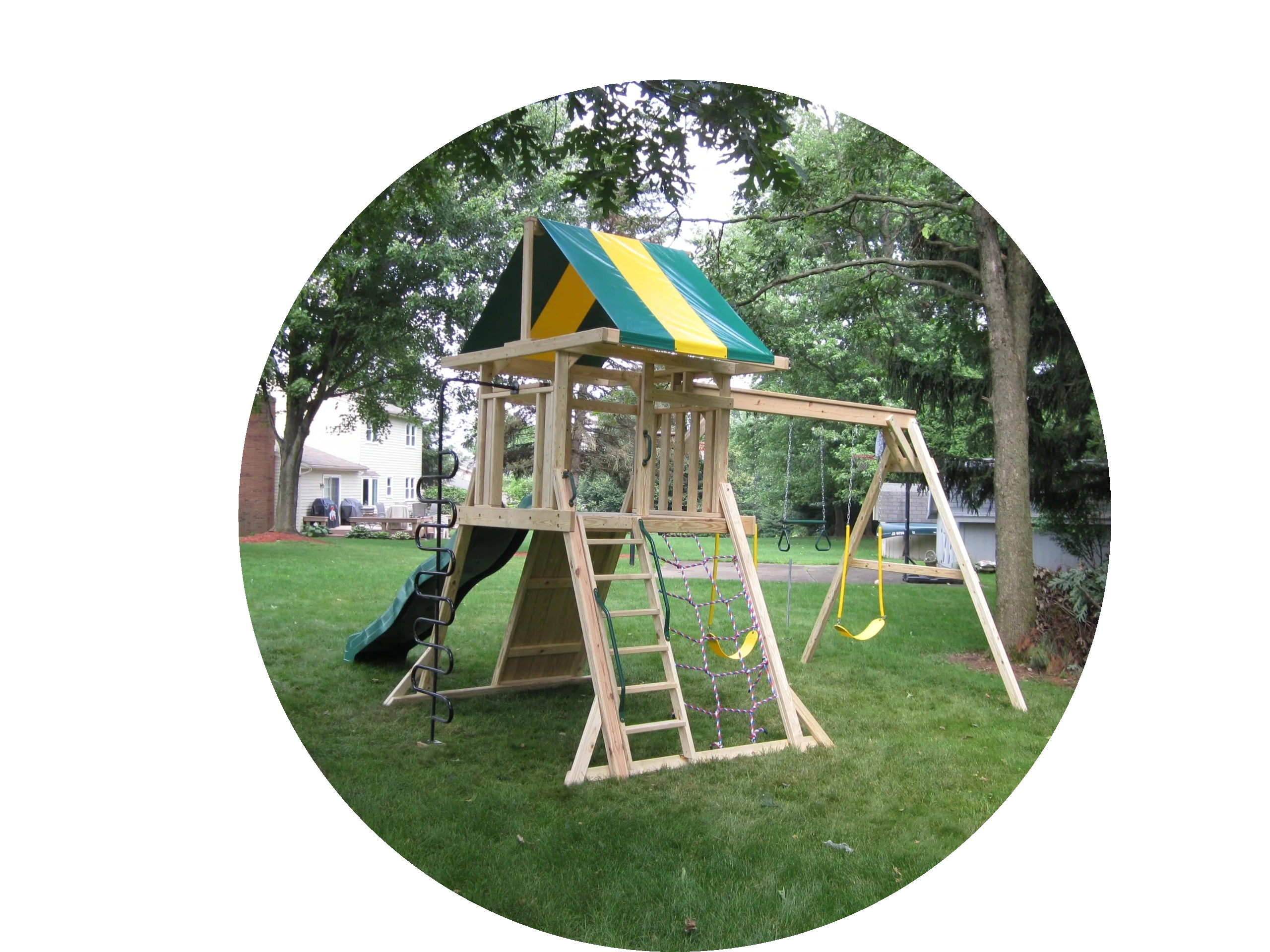 Single tower wooden playset, mountain climber tower with rockwall, slide, swings