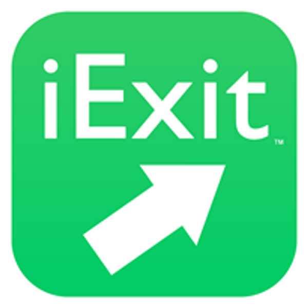 a green exit sign with an arrow pointing to the left
