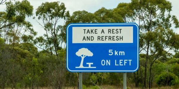 blue rectangle rest area sign