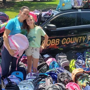Picture of  donated backpacks for "Backing the Need" School Supply Drive from 2021.