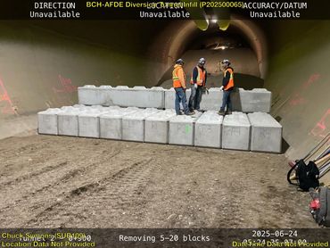 group of people working in tunnel