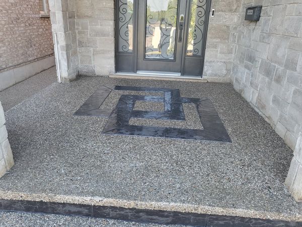Exposed aggregate porch with design