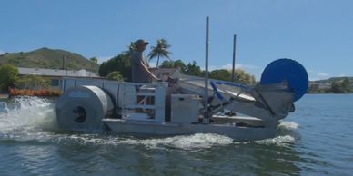 Eco-Harvester Salt Water Ocean Traveling from Kaelepulu to Kawainui in Kailua Hawaii.
