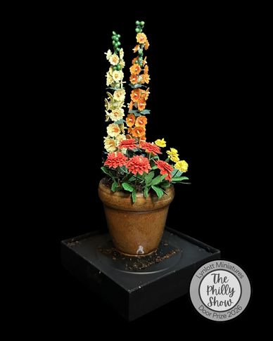 Miniature potted flower arrangement.