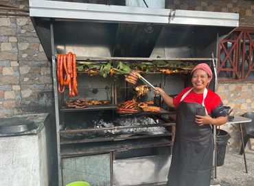 Picture of a woman cooking local food in Mindo Ecuador