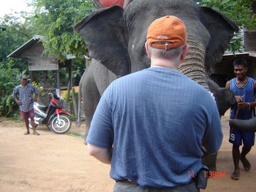 Making friends with a bull elephant in Thailand.