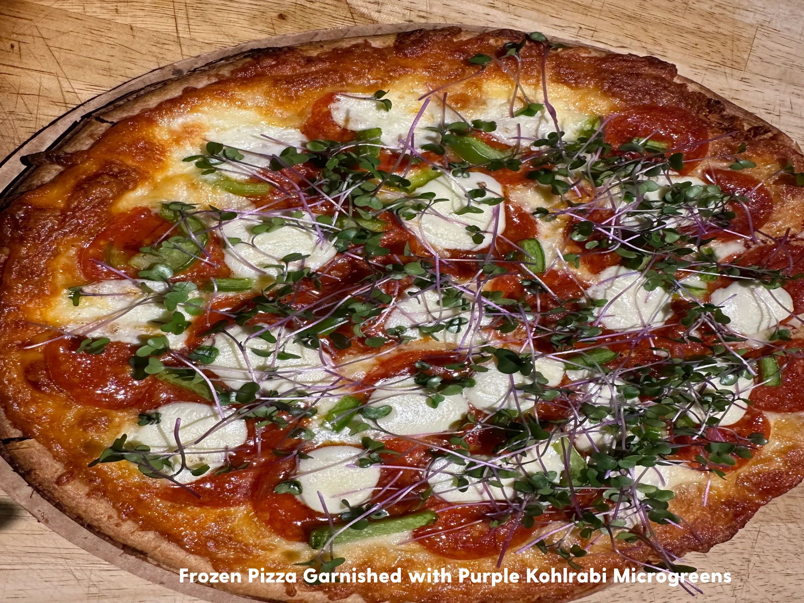A simple frozen pizza garnished with Purple Kohlrabi Microgreens. Dressing up your food and making i
