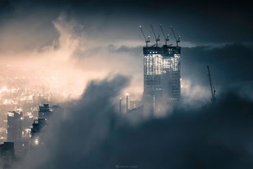 Famous dubai fog photo by ahmad alnaji professional cityscape and aerial drone photographer in Dubai