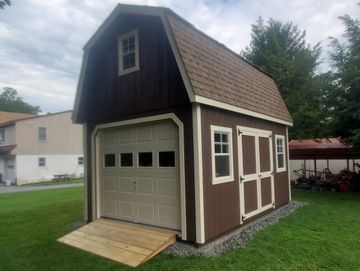 2 story garage with wooden floor