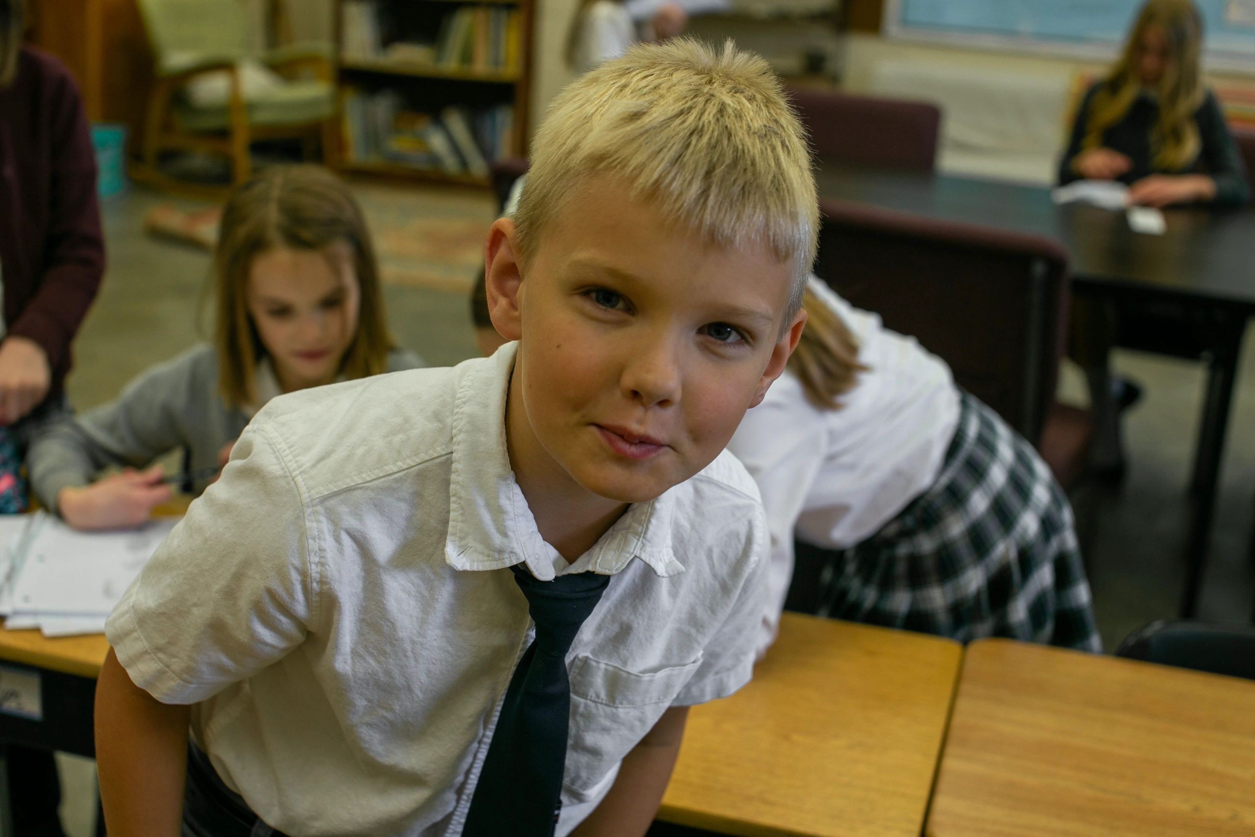 Student smiling and learning