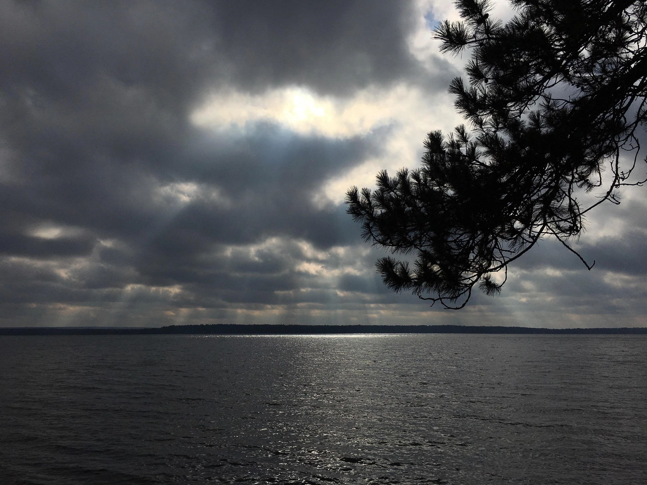 Sunshine through clouds on Grindstone Lake Hayward Wisconsin 