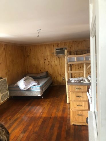 Original wood-paneled kitchen prepared for remodeling and countertop upgrades.