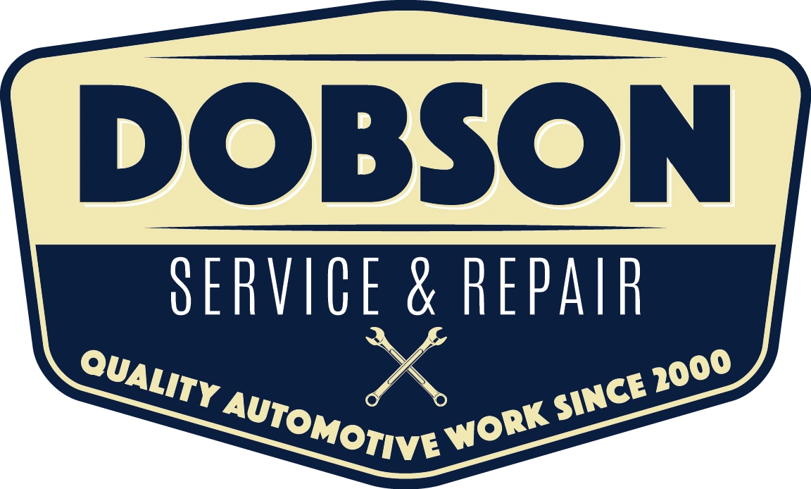 Logo. Crossed wrenches at center. Dobson Service & Repair. Quality automotive work since 2000.