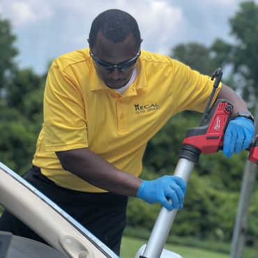 Regal Glass Services installing new windshield in Franklin Virginia