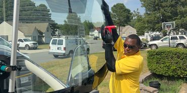 Regal Glass Services installing auto glass in Suffolk Virginia
