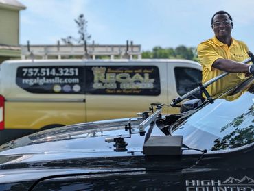 Regal Glass Services installing auto glass with mobile van