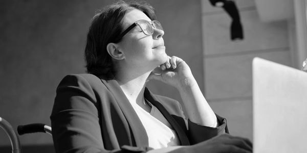 A woman feeling empowered towards economic independence.