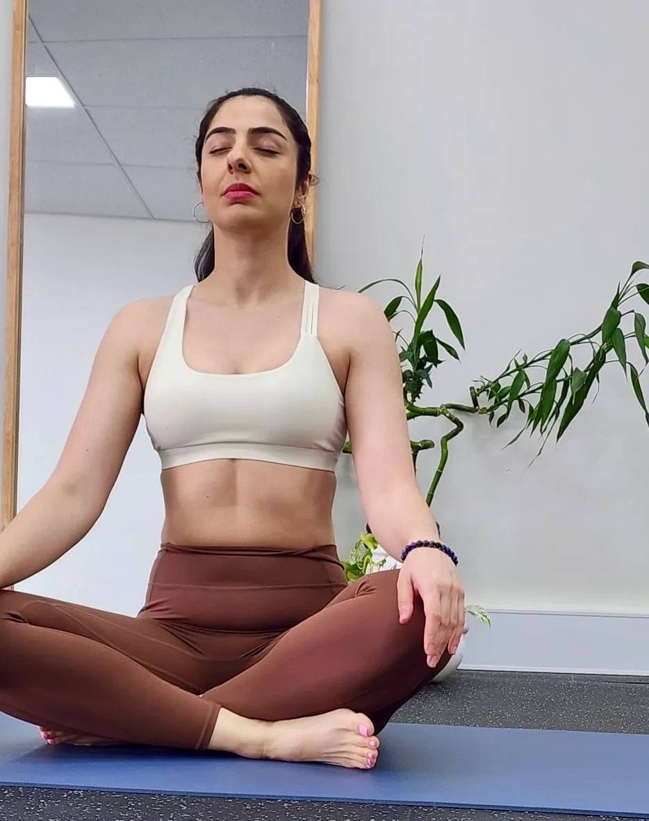 Fifi sitting in a Yin Pose Fifi sitting in a Yin Pose