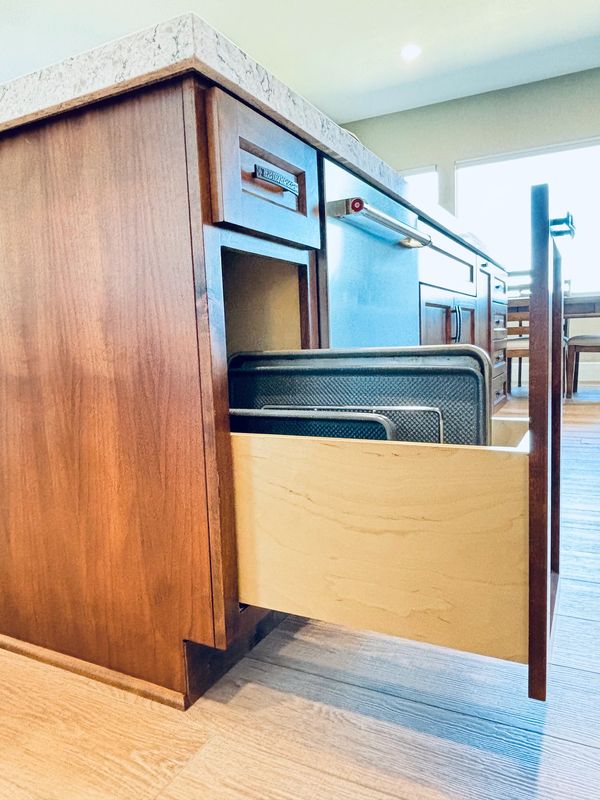 Slide out for cutting boards, baking sheets and large items